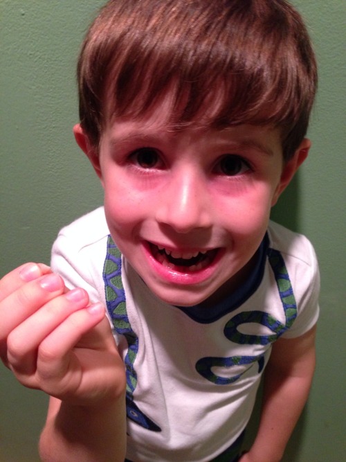 Guess who lost his second tooth? Big score the night before the first day of school!